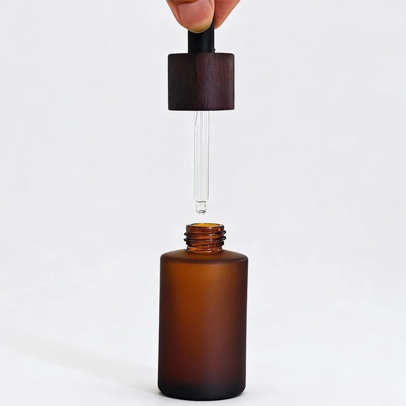 30ml amber glass dropper bottle with black pipette